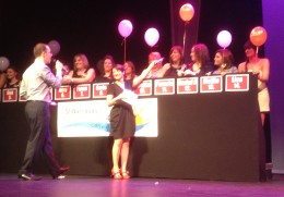 Contestants and Presenter on stage