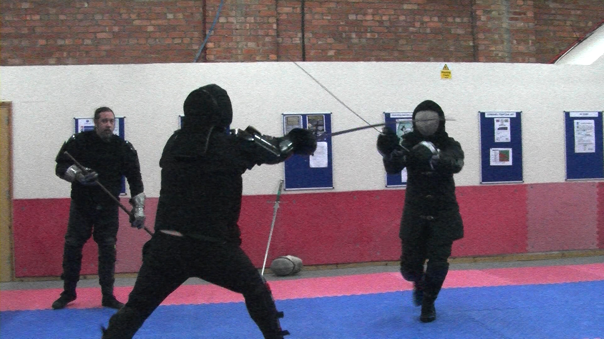 Two fighters duel it out in a sword fight at Wolfshead Martial Arts centre in Lincoln.