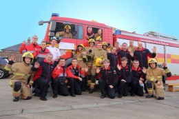 Nettleham Road fire station present cheque to St Barnabas Hospice staff member