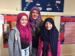 Lucy, Vicky and Katelyn Henderson trying out the hijabs at the mosque open day in Lincoln.