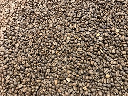 Freshly roasted coffee beans made at Stokes' newly renovated roastery.