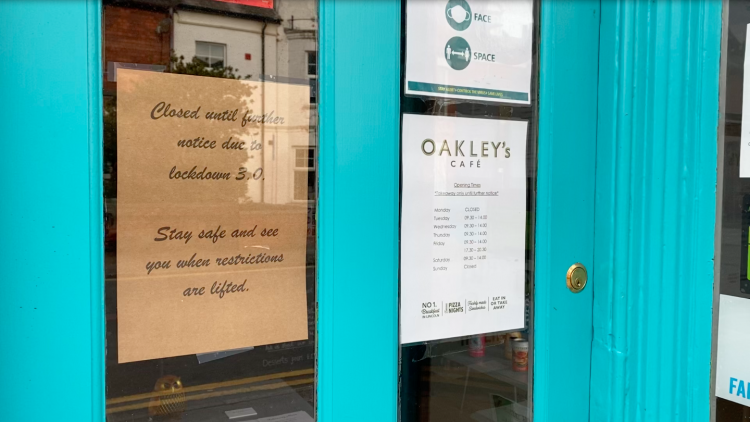 A closure sign on the door of Oakley's Cafe, Lincoln. This cafe had to shut due to the closure of hospitality businesses in the UK's third national lockdown. Photo: Sophie Smith